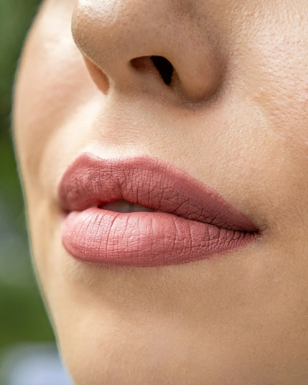 Close-up of full lips with a crisp, defined lip border and Cupid's bow